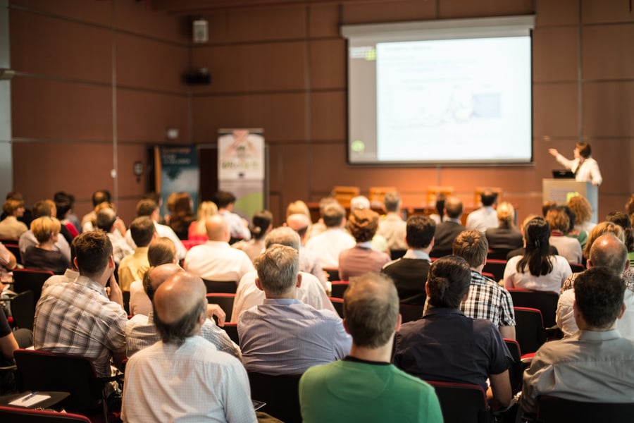 Speaker Giving Presentation on Scientific Business Conference