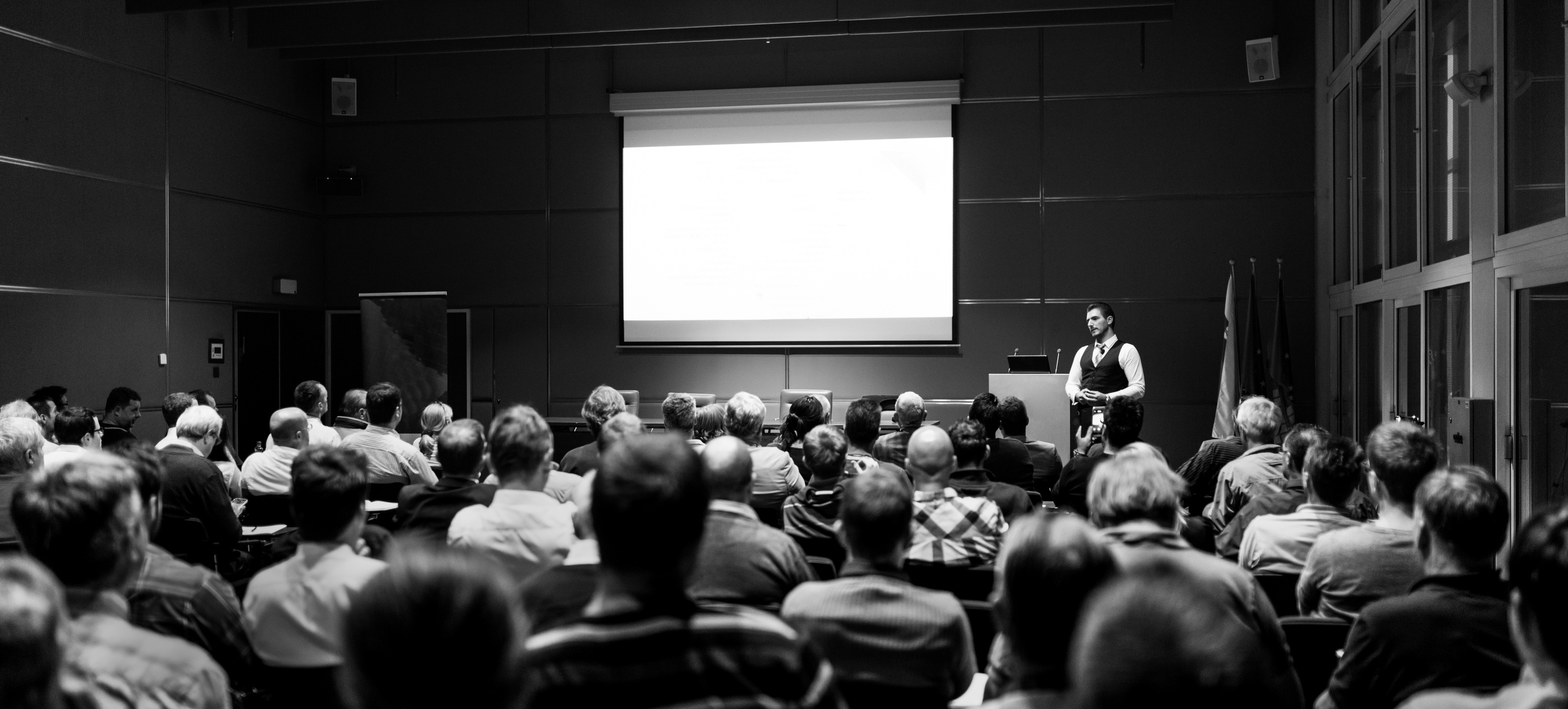 Speaker Giving Presentation on Business Conference Event